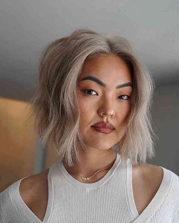 an icy blonde soft blunt haircut with invisible layers is a beautiful idea with a youthful feel