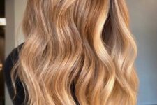 fantastic long light brunette hair with gold and honey blonde balayage and waves is a chic and catchy idea for summer