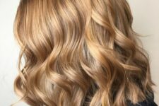 gorgeous wavy golden blonde wavy hair with a darker root is a fantastic idea any time, it looks flattering and beautiful