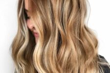 long light bruntte hair with gorgeous honey and gold blonde highlights and waves plus face-framing locks is amazing