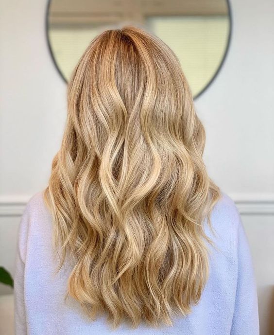 long naturally golden blonde hair with waves is a lovely and cool solution that will make you feel a Rapunzel