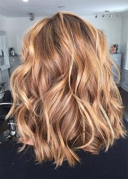 Medium length ginger hair with honey and gold blonde balayage and waves is a very beautiful idea