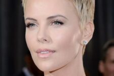 Charlize Theron rocking a chic short blond pixie haircut looks heavenly