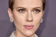 Scarlett Johansson wearing a textural short blonde pixie looks very chic and daring