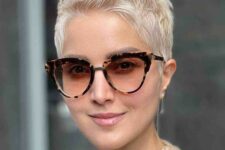 a beautiful creamy blonde pixie cut with styling on the top looks bold, chic and cool