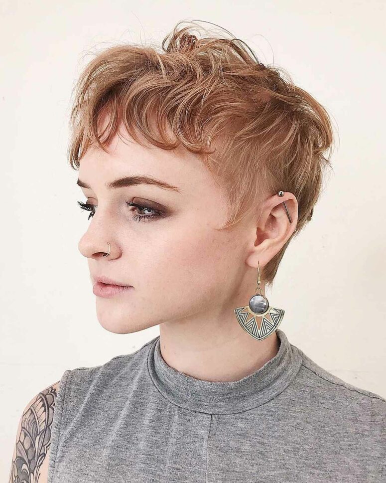 a choppy layered pixie in ginger and with caramel balayage plus a fringe is a very nice and chic idea