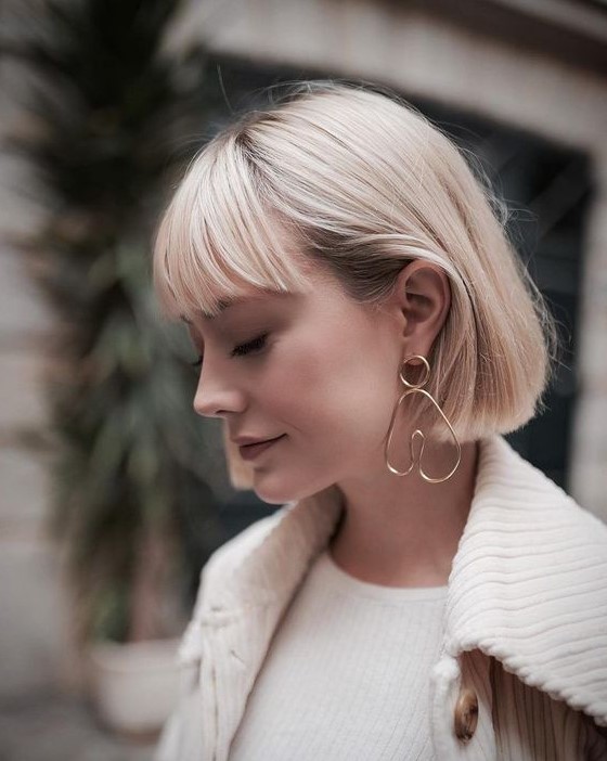 a cool short blonde bob with fringe bangs always works, this is an absolutely timeless idea