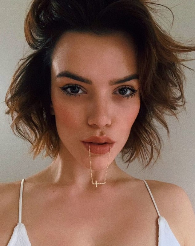 A flipped shaggy brown bob with messy texture and waves   change the parting as you like