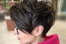 a long layered brunette pixie cut features movement and texture, try it longer on the top and shorter on the sides