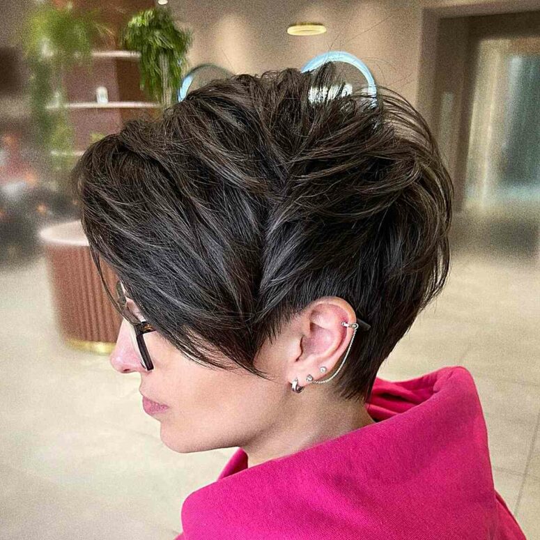 a long layered brunette pixie cut features movement and texture, try it longer on the top and shorter on the sides