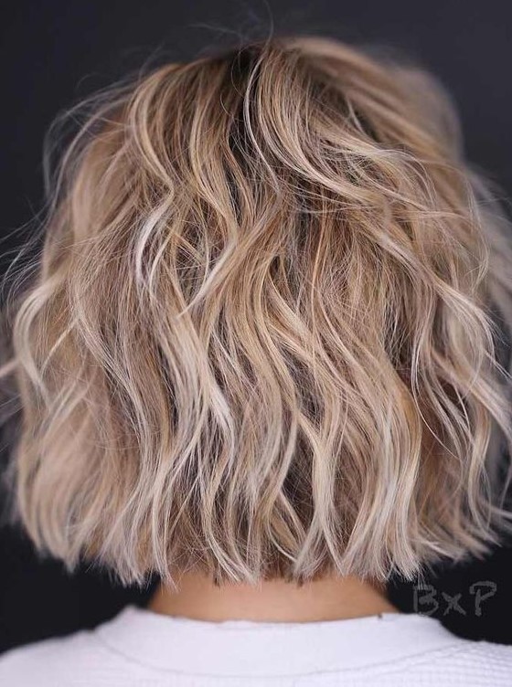 a lovely blonde balayage choppy bob with waves is a lovely idea that looks fresh, messy and effortlessly chic