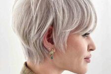 a platinum-toned layered long pixie cut requires only a blow dry for a beautiful and stylish look