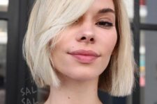 a pretty blonde midi bob with side bangs is always a good idea if you love blonde, add texture and volume to it