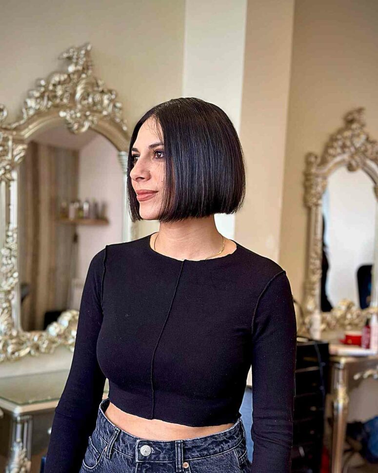 a sleek effortless chin bob in black is a classic idea for any type of hair