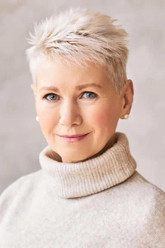 an icy blonde short pixie cut with texture and volume is a nice solution for women of elegant age