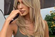 gorgeous long golden blonde hair with layers and Bardot bangs plus a darker root is an amazing idea