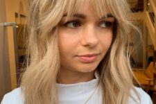 long and textured blonde hair with waves and fringe bangs is a cool idea, rock such a trendy hairstyle anytime