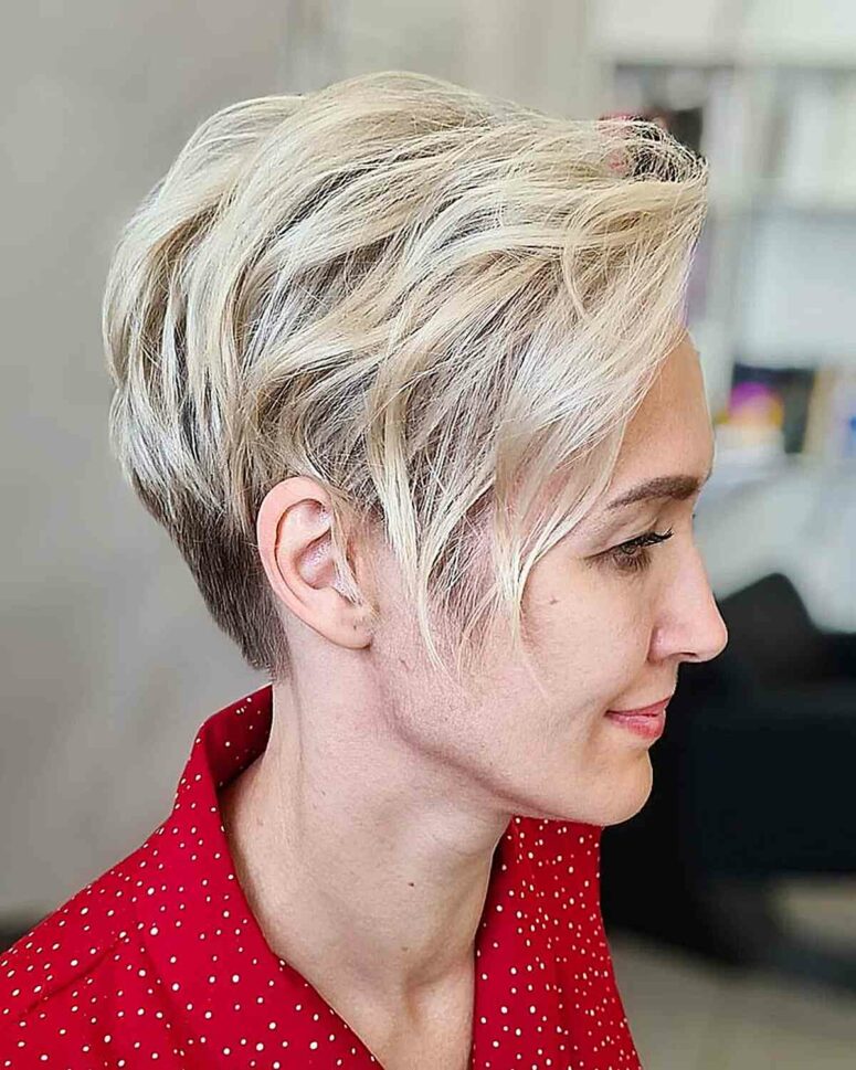 a pixie with blonde balayage and long side bangs, waves and dimension is a lovely idea to rock