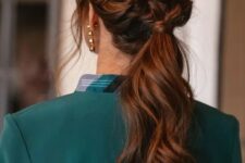 a beautiful low ponytail with a braided halo and some face-framing locks is a cool idea for a modern or boho look