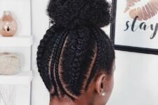 a braided back plus a large bun on top is a trendy and cool hairstyle that always works