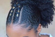 a crossover braid design at the front and a high puff at the back for a quick and natural hairstyle