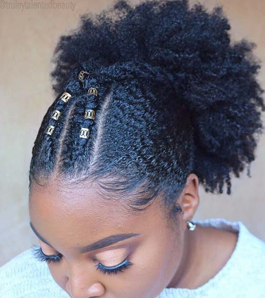 a crossover braid design at the front and a high puff at the back for a quick and natural hairstyle
