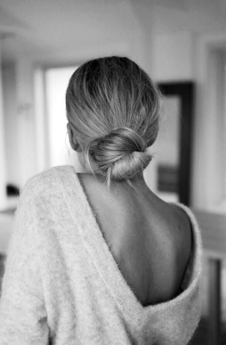A knotted low bun with a textured top is a cool 5 minute hairstyle to pull off for many occasions
