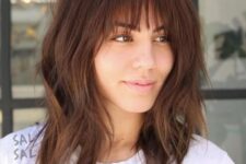 a layered long bob with wispy bangs, shaggy layers for a bit of grunge is a lovely idea to rock right now