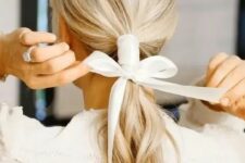 a lovely ponytail with a ribbon bow