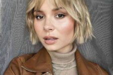 a relaxed blonde wavy jaw-line bob with wispy bangs is a good idea for thin hair, it looks lovely