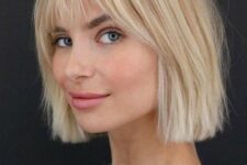 a short messy blonde bob with wispy bangs is a very lightweight and airy idea to try