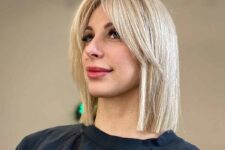 an elegant blonde lob with curtain bangs and straight hair is a very stylish idea to rock right now