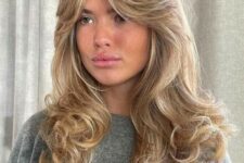 beautiful long blonde hair with layers to remove weight, curls at the ends and soft curtain bangs is a gorgeous idea