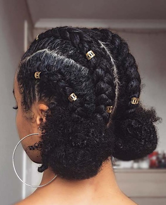 cornrows into space buns is a fun and cute idea, and you can accessorize your hairstyle with gold hair cuffs
