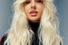 long textural blonde hair with choppy ends and soft face-framing curtain bangs is a lovely idea to try