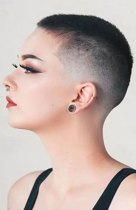 a black buzz cut with fade, which is a great idea to personalize your cut, the same length on the top and back