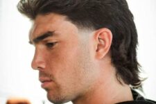 a black mullet with a modern feel is a cool hairstyle to rock right now, add some volume to make it look cooler