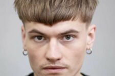 a bowl haircut with an angular fringe and a lot of volume will require styling to look like that