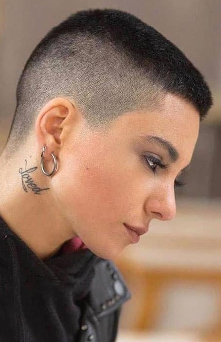 a buzz cut mohawk is a rebellious and catchy idea that shows off texture, color and cut and is very daring