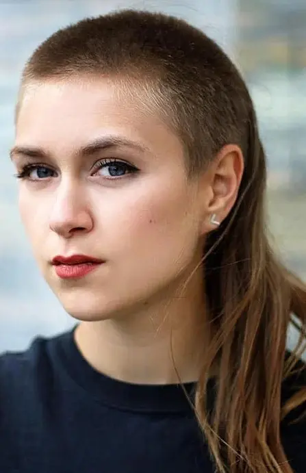 a buzz cut mullet is a unique combo of two haircuts, it's daring and bold and will create an interesting contrast