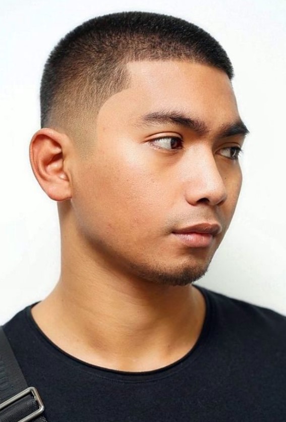 a buzz haircut with a faded temple and short line up is a cool idea that looks bold and modern