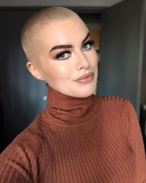a classic and very short buzz cut looks nice, and you can highlight it with some bold color