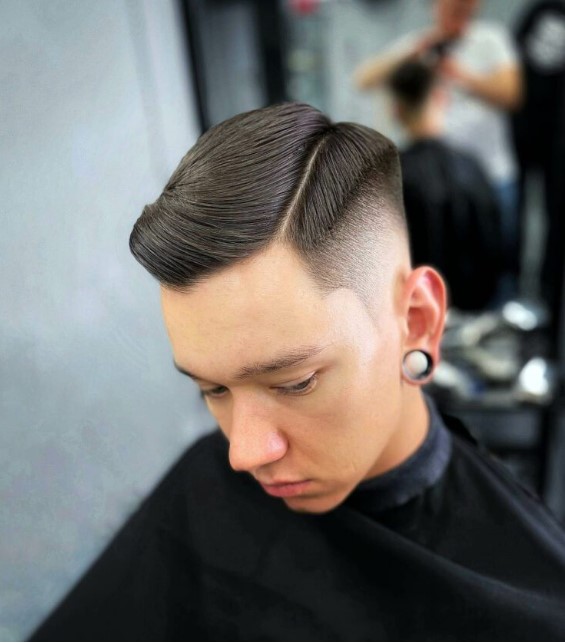 a classic thick side part wiht faded sides, a taper fade with temple fading for a perfect gentleman's style
