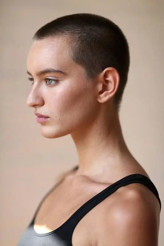 a dark brunette buzz cut is classics that always works, and such delicate shade highlights your eyes