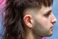 a layered mullet wolf cut is a cool and fun idea with a faded touch, it will give you a pink look