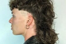 a long mullet wolf cut with shaved sides is a cool idea that shows off your curls is a cool and contrasting idea due to the shaved sides