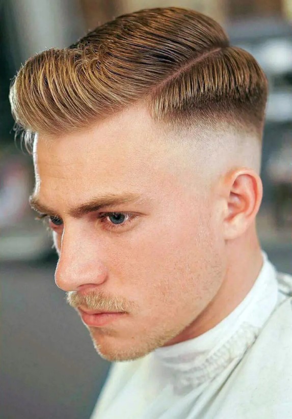 a pompadour with a side part is a cool idea that is timeless and quite whimsical