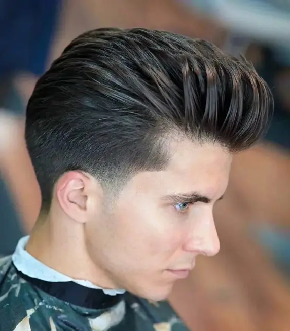a pompadour with tapered sides is versatile enough to wear with lots of outfits and will compliment your features