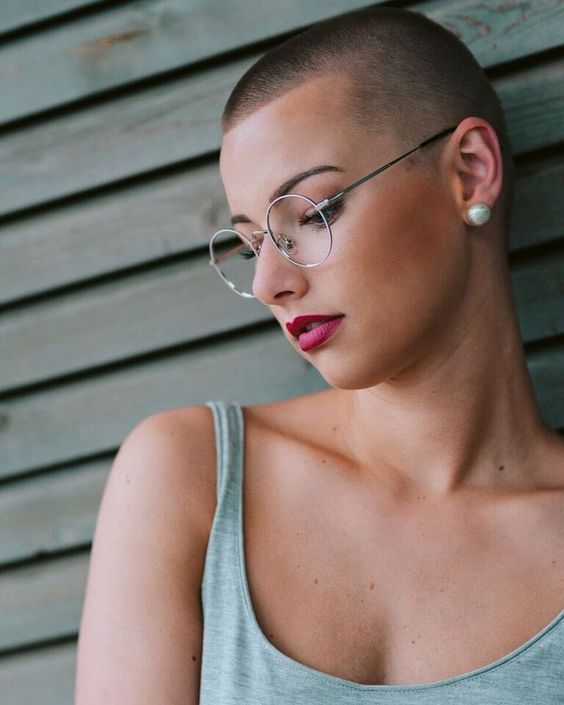 a short buzz cut with fade is a catchy and chic idea for a modern gal who wants a daring look