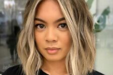 a shoulder-length bob with blonde balayage and money piece, with money piece looks amazing with waves